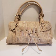 Charlie Lapson Corc Embossed Cream Handbag .New Never Used Any Tiny Flaws Are From Storing Only Measures Approx 17" X 9 1/2" Handles 10". Beige Handheld Satchel In Soft Leather, Beige Soft Leather Handheld Satchel, Handheld Beige Soft Leather Satchel, Beige Hobo Bag With Handle Drop For Daily Use, Cream Leather Shoulder Bag With Adjustable Handle, Beige Leather Bag With Adjustable Handle, Beige Satchel With Handle Drop For Daily Use, Beige Soft Leather Pouch Satchel, Beige Pouch Shoulder Bag With Handle Drop