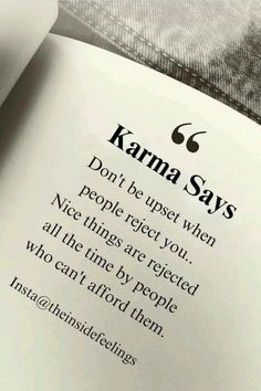 an open book with the words karma says on it