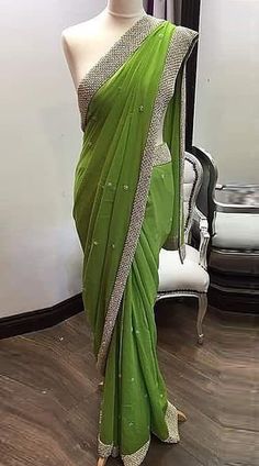 Light Parrot Green Georgette Lace Work Saree for Evening Party Fitted Pista Green Blouse Piece For Wedding, Pista Green Pre-draped Saree With Mirror Work For Wedding, Green Cutdana Traditional Party Wear, Green Floor-length Blouse For Wedding, Green Floor-length Blouse Piece For Wedding, Pista Green Wedding Blouse With Mirror Work, Green Floor-length Wedding Blouse Piece, Elegant Green Pre-draped Saree With Dori Work, Fitted Pre-draped Saree With Dori Work For Wedding