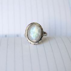 Rainbow moonstone ring, Sterling Silver ring, cocktail ring, alternative engagement ring, Rainbow moonstone jewelry, Valentine's day jewelry, silver jewellery Description: Be assured that the product you order is MADE JUST FOR YOU and is not a mass produced item. The gemstone is a pear shaped RAINBOW MOONSTONE The rest of the ring is made from 925 STERLING SILVER i.e 92.5% pure silver. And it DOESN'T HAVE ANY LEAD OR NICKEL. I make more than 50 DIFFERENT GEMSTONES. If you want other gemstones, P Silver Crystal Ring With Gemstone, Silver Crystal Birthstone Ring, Mystical Silver Crystal Ring With Gemstone, Silver Mystical Crystal Birthstone Ring, Bohemian Silver Moonstone Ring, Unique Opal Ring With Moonstone, Iridescent Oval Sterling Silver Jewelry, Ethereal Sterling Silver Gemstone Jewelry, Mystical Moonstone Open Ring Jewelry