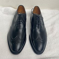 Like New/ Never Worn But Has A Few Scuffs From Being Stored Without Box. The Inner Has Some Scuffs But Can't Be Seen When Worn. See Pics. Classic, Preppy, Work, Career, Academia, Corporate, Office, Corporatecore, Wedding, Minimalist, Dressy Shoes. Size 10.5 Designer Goodyear Welted Loafers For Formal Occasions, Designer Goodyear Welted Formal Loafers, Black Pointed Toe Dress Shoes With Goodyear Welt, Black Cap Toe Leather Shoes For Formal Occasions, Formal Dress Shoes With Leather Sole And Round Toe, Black Snip Toe Oxfords For Formal Occasions, Black Oxfords For Business With Snip Toe, Black Cap Toe Formal Loafers, Black Cap Toe Loafers For Formal Occasions