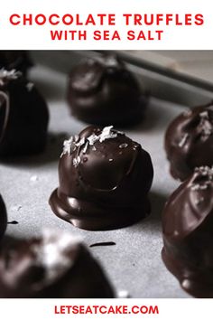 chocolate truffles with sea salt are on a baking sheet, ready to be eaten