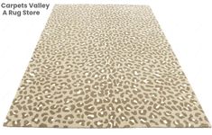 a leopard print rug is shown with the words carpets valley and a rug store on it