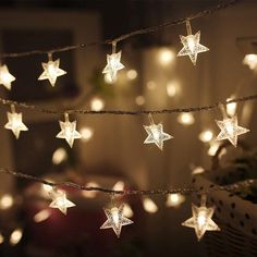 string lights with white stars hanging from them