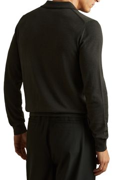 Fine-gauge wool provides luxe comfort in a trim polo knit with long sleeves that layers easily and looks splendid on its own. 26 1/2" length (size Medium) Point collar Long sleeves 100% wool Dry clean or hand wash, dry flat Imported Fitted Cashmere Polo Sweater In Fine Knit, Fitted Cashmere Polo Sweater With Fine Knit, Classic Fitted Cashmere V-neck Sweater, Classic Long Sleeve Sweater For Formal Occasions, Fitted Fine Knit Cashmere Polo Sweater, Classic Fitted V-neck Cashmere Sweater, Classic Cashmere V-neck Sweater With Long Sleeves, Elegant Long Sleeve Merino Wool V-neck Sweater, Fitted Wool Turtleneck Polo Sweater