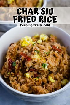 two bowls filled with fried rice and vegetables