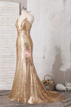 Gold Mermaid Dress With Sweep Train For Prom, Gold Floor-length Mermaid Dress For Prom, Gold Backless Sequin Prom Dress, Gold Backless Sequin Dress For Prom, Glamorous Gold Mermaid Dress For Prom Season, Glamorous Gold Mermaid Dress For Prom, Glamorous Gold Sequin Mermaid Dress, Glamorous Gold Mermaid Dress With Sequins, Gold Sequined Mermaid Dress For Formal Occasions