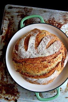 a loaf of bread sitting on top of a white plate