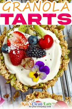 granola tarts with berries, kiwis and strawberries on top in front of the title