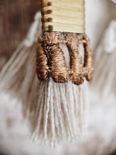 These light weight statement earrings are composed of handmade beige fringe tassels with vintage hand dyed lace and pure brass metal components. A boho tassel earring that is authentically unique. The lace trimming comes in black, white, terracotta (rusty brick), mustard (ochre yellow), beige (sand), Desert rose (dusty pink), magenta (beetroot pink), burgundy (red wine), navy (dark blue), teal (dark turquoise), evergreen (dark emerald) or Dark moss (army green). --------------------------------- Bohemian Brown Beaded Tassel Earrings, Brown Bohemian Tassel Earrings, Bohemian Brown Tassel Earrings, Bohemian Brown Fringe Earrings, Brown Fringe Tassel Earrings For Festivals, Beige Bohemian Fringe Earrings, Bohemian Beach Tassel Necklace With Fringe, Beige Tassel Dangle Earrings, Elegant Fringe Tassel Earrings For Beach