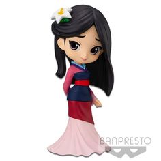 a figurine of a woman in a dress with flowers on her head and long black hair