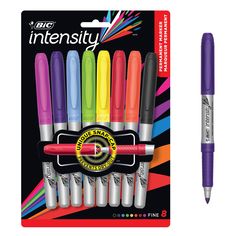 an assortment of different colored pens in front of a card with it's packaging