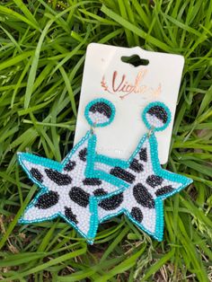 "Star shaped seed bead earrings. Cow print. Black/white/turquoise. Post back. Approximately 3\"x3\" **These are handmade so variations may occur**" Native American Earrings, Beaded Jewlery, White Turquoise, Seed Bead Earrings, Bead Earrings, Cow Print, Star Shape, Seed Bead, Beaded Earrings