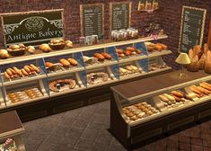 a display case filled with lots of different types of doughnuts and pastries