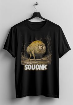 Celebrate one of Pennsylvania's most elusive and endearing cryptids with our Squonk Cryptid Shirt! This unisex t-shirt showcases the legendary Squonk, a mythical creature said to roam the Allegheny Forest, known for its sad and elusive nature. Whether you're a fan of cryptid lore, Pennsylvania folklore, or just love unique and quirky designs, this Squonk T-shirt is a perfect addition to your collection. Ideal for cryptid enthusiasts and lovers of the weird and wonderful, this shirt makes a fantastic gift for anyone fascinated by mythical creatures. Show off your love for Pennsylvania's own Squonk and stand out with this whimsical and quirky tee! Features: High-quality graphic print Soft, comfortable unisex fit Available in various sizes Perfect for cryptid lovers, folklore enthusiasts, and Cryptid Shirt, Digital Ink, Mythical Creature, Quirky Design, Weird And Wonderful, Fantastic Gifts, Personalized Shirts, Mythical Creatures, Pennsylvania