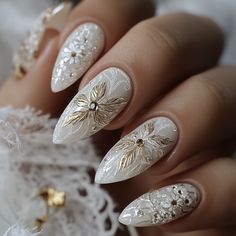 Transform your nails into a masterpiece with Artistic Wonderland Nails—a perfect blend of elegance and festive charm. The crisp white base with intricate gold floral details creates a sophisticated, high-end design. The sparkling gems add a touch of glamour, making these Christmas nails the ultimate choice for a chic look.  #ArtisticWonderlandNails #ChristmasNails #GoldFloralNails #LuxuryNailArt #HolidayNailDesign #ElegantNails #FestiveManicure #GlamorousNails #SophisticatedNails #ChristmasStyle Gold And Silver Christmas Nails, Wonderland Nails, Sophisticated Nails, Festive Manicure, Nails Elegant, Neutral Christmas Decor, Neutral Christmas, Floral Christmas