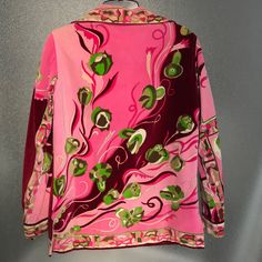 Gorgeous Velvet Vintage Pucci Jacket From Sac's Vintage Size 10 Perfect For Spring Covered In Emilio's And Tulips..Love This Pattern, So Classic And Still Goes With Everything..Jeans And Tshirt Or Classy Trousers And A Blouse..Or A Modern Bodycon With Knee Hi Boots! Condition Is Vintage, It Had Some Discoloration When I Bought It, But My Hair Covered It Enough I Didn't Take It To The Cleaners..Maybe You Do?? In The Last Three Photos... Interior Is Still Intact, All Velvet Covered Buttons In Place, No Smells Or Stains..Stored Away From Pets And Non Smoking.. Thank You For Looking Liking And Sharing, I Will Do The Same For You! Tulips Color, Classy Trousers, Luxury Vintage Multicolor Blouse, Green Tulips, Emilio Pucci Spring Summer 2023, Vintage Pucci, Pucci Scarf Vintage, Pucci Vintage, Emilio Pucci Printed Silk Scarf