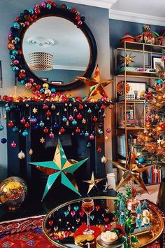 a living room filled with christmas decorations and a fire place