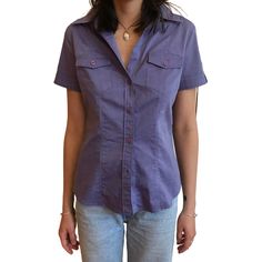 Purple Short Sleeve Top With Button Closure, Purple Short Sleeve Button Blouse, Purple Short Sleeve Blouse With Buttons, Purple Short Sleeve Shirt With Buttons, Fitted Purple Top With Button Closure, Fitted Purple Top With Buttons, Fitted Short Sleeve Tops With Covered Buttons, Cotton Short Sleeve Blouse With Snap Buttons, Cotton Blouse With Snap Buttons Short Sleeve