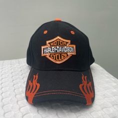 Size Is Adjustable. In Perfect Condition Orange Sports Cap, Casual Orange Sports Hat, Adjustable Orange Hat With Embroidered Logo, Orange Adjustable Hat With Embroidered Logo, Adjustable Orange Hat With Letter Print, Orange Letter Print Cap, Harley Davidson Accessories, Adjustable Hat, Black Orange