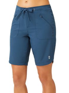 Summer fun starts with the Free Country Bermuda Board Shorts for Ladies! UPF 50+ sun protection safeguards your skin from harmful UV rays, even during extended outings. Lightweight 93% polyester/7% spandex fabric dries fast for comfortable transitions in and out of the water. 2 zippered front pockets sport rivets for faster drainage and drying. Adjustable tie waist provides a tailored fit just for you. Zippered fly. Wear these women's board shorts on their own or as a cover-up for your favorite Athleisure Sports Bottoms With Upf 50+, Functional Sports Bottoms With Upf 50+, Functional Sport Bottoms With Upf 50+, Casual Workout Bottoms With Upf 50+, Sporty Activewear With Side Pockets For Travel, Stretch Moisture-wicking Bottoms For Travel, Moisture-wicking Stretch Bottoms For Travel, Functional Moisture-wicking Bottoms For Travel, Functional Moisture-wicking Travel Bottoms