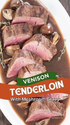 steak with mushroom gravy in a white bowl on top of a wooden table