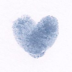 a fingerprint in the shape of a heart is shown on a white sheet with blue ink