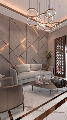 a modern living room with marble floors and walls, along with an elegant chandelier hanging from the ceiling