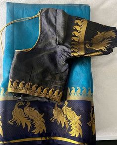 This is a beautiful blue saree with peacock border in purple. Stitched blouse with sleeves elbow length. Blouse can be altered to extend from size 34- 40". Elbow Length Blouse, Blouse With Sleeves, Sky Blue Saree, Blue Saree, Beautiful Blue, Sky Blue, Blue Sky, Saree, Purple