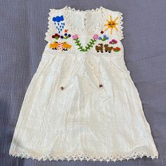 New Without Tags. My Daughter Outgrew Before She Could Wear. Bought From A Handmade Shop. 12-18 Months Roughly (No Tags) Cotton Dress With Floral Embroidery For Playtime, Playful White Embroidered Dress, White Embroidered Dress For Playtime, Embroidered Dress, Kids' Dresses, Handmade Shop, My Daughter, Casual Dresses, Colorful Dresses