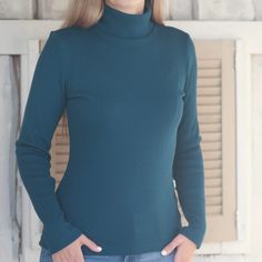 Do you like feeling stylish and warm? Try our 100% Merino wool high-neck jumpers for women. Start the cold season of the year with our exceptional 100% merino wool turtleneck jumper. This elegant high-neck sweater not only looks great but also keeps you pleasantly warm and cosy.  Some features of this merino wool sweater: ✔ Green Rose turtleneck jumper is made from luxurious merino wool, which ensures warmth in the cold season. In addition to that, it is also exceptionally soft and feels pleasant next to the skin. ✔ The high collar of the sweater not only looks stylish but also protects your neck from the cold. ✔ This knitted jumper is just as warm as a regular thick woollen jumper; however, it is much thinner. The fabric is knitted in rib stitch which adapts to the body contours and gives Merino Wool Long Sleeve Turtleneck For Fall, Long Sleeve Merino Wool Turtleneck For Fall, Winter Merino Wool Long Sleeve Turtleneck, Winter Long Sleeve Merino Wool Turtleneck, Winter Ribbed Turtleneck, Winter Ribbed High Neck Turtleneck, Merino Wool Turtleneck With Funnel Neck For Winter, Merino Wool High Neck Turtleneck For Fall, Solid Merino Wool Tops For Winter