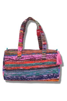 The Santa Barbara Handbag in Berry is a colorful accessory for any day of the week. This large handbag has a fun turquoise liner with a zipper pouch and 2 convenient quick-access pockets perfectly sized for your phone and sunglasses. What makes the Santa Barbara collection so special? Our Santa Barbara Collection is designed from Indian Chindi rugs. These rugs are composed of remnant fabrics making them eco-friendly and unique with each piece. That means no two are exactly the same, just like yo Chindi Rugs, Turquoise Interior, Sustainable Accessories, Large Handbag, Bright Stripes, Eco Friendly Bags, Colorful Accessories, Zippered Pouch, Large Handbags