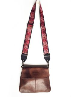 "The Harper Guitar Style Bag Strap By Native Sons Tap into your inner Rock God with A Native Sons Strap! This Stunning strap is made with a glorious Red, Coral, and Pink floral Jacquard with lovely black background. Choose your Backing: - Black Nylon - A Classic Choice- extremely durable, excellent drape, feels Oh so luxurious! - Natural Hemp- Native Sons is proud to play a part in bringing the textile mills back to the United States! Our herringbone was designed and woven exclusively for Native Travel Guitar, Cheap Guitars, Learn To Play Guitar, Best Headphones, Guitar Shop, Learn Guitar, Guitar Strap, Red Coral, Custom Leather