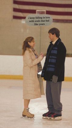 a man and woman standing next to each other on an ice rink