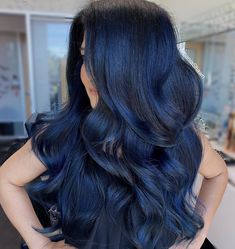 Discover the magic of blue and black hair color—a unique blend that goes beyond the ordinary. Whether you prefer the deep tones of midnight blue or th... Midnight Blue Black Hair Color, Blue Black Hair Dye, Midnight Blue Hair, Blue Black Hair Color, Blue Hair Highlights, Blue Black Hair, Blue Ombre Hair, Dark Blue Hair, Black Hair Dye