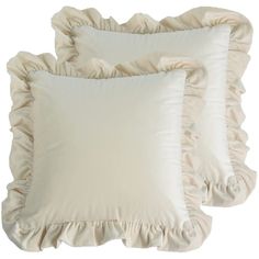 three white pillows with ruffled edges