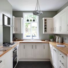 the kitchen is clean and ready for us to use in its new owner's home