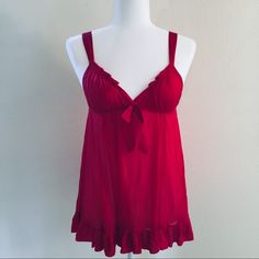 Victoria’s Secret Red Semi-Sheer Babydoll And Panties Set - Size: Small - Color: Red - Material: 63% Modal 37% Nylon - Features: Adjustable Straps (Back Of Straps Say “Angel” Very Faintly In Script Lettering, See Photo), Red Center Bow And Ruffle Detail. - Condition: Tags Removed, Never Worn. - Smoke Free Pet Free Home. - Comes With Both The Bikini-Style Panties And Babydoll. Victoria's Secret Red Coquette Sleepwear, Red Coquette Victoria's Secret Sleepwear, Script Lettering, Women's Intimates, Victoria’s Secret, Baby Dolls, Adjustable Straps, Victoria's Secret, Slip On