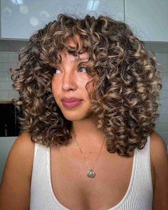 25 Vibrant Curly Hair Color Ideas for a Stunning Makeover Highlights Brown Hair Short Curly, Sunkissed Highlights Curly Hair, Dimensional Curly Hair, Spring Curly Hair Color, Blonde Highlights Short Curly Hair, Sunkissed Hair Brunette Curly, Sunkissed Curly Hair, Highlights Short Curly Hair, Short Curly Hair Blonde Highlights