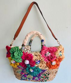 Fantastically beautiful Ibiza basket with various flowers in pink, green, yellow and blue on the front. On the back, the basket is embroidered with sequins and flowers. The inside pockets have lace and a zipper. There is also an extra leather strap for hanging around your neck. The basket is handmade. Simply a dream. Perfect for going out and a real eye-catcher. Country Bags, Basket With Flowers, Bag Tutorials, Pink Green Yellow, Bags Tutorial, Yellow And Blue, Storage And Organization, Sewing Tutorials, Storage Baskets