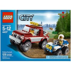 the lego city fire truck is driving down the road