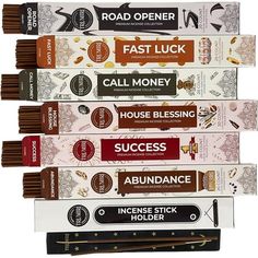 five incense sticks stacked on top of each other in different colors and sizes, with the words fast luck call money above them