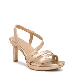 Display an elegant appeal with these women's Naturalizer Brenta bronze low heel dress sandals. Made with a strappy synthetic upper, these sandals flaunt an almond open toe and a slingback strap closure. Features include airy synthetic lining, Contour + Comfort technology and sculpted synthetic insole for an ideal fit, Arch + Heel support to help relieve pressure, and a slip-resistant sole with covered block heel. | Naturalizer Women's Brenta Platform Sandal in Bronze Size 9. 5 Medium Strappy Block Heels, Naturalizer Shoes, Shoe Company, Boots And Sneakers, Dress Sandals, Kids Boots, Dress And Heels, Low Heels, Platform Sandals