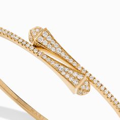 18 Karat Gold Full Diamond Slim Slip-On Bracelet This distinctive design features a bracelet crafted from 18K white, rose, or yellow gold, brilliant-cut diamonds up to the pyramids. It can be worn alone or layered with other pieces of the collection for a fashion-forward look. Cleo by Marli draws inspiration from Cleopatra, evoking her strength and power capturing enriching color and daring design. Designer Bracelets With Brilliant Cut Diamonds, Designer Diamond Bracelet With Brilliant Cut, Designer Diamond Bracelet With Pave Setting, Designer Diamond Bracelets With Pave Setting, Designer Yellow Gold Bracelets With Single Cut Diamonds, Designer Yellow Gold Diamond Bracelet With Single Cut Diamonds, Luxury Diamond White Jubilee Bangle, Designer Gold Bracelets With Brilliant Cut, Luxury Yellow Gold Diamond Bracelet With Single Cut