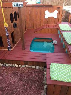 a dog house with a pool in the middle