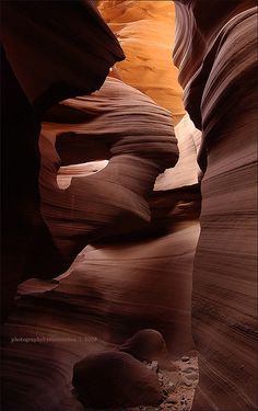 a narrow slot in the side of a canyon