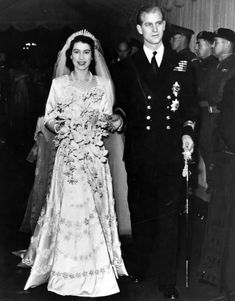 an old black and white photo of a bride and groom