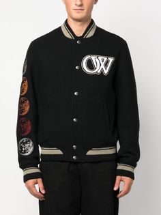 Off-White logo-appliqué Bomber Jacket - Farfetch Black Embroidered Logo Varsity Jacket For Fall, Black Varsity Jacket With Striped Cuffs For Winter, Black Varsity Jacket With Striped Cuffs For Fall, Black Varsity Jacket With Striped Cuffs And Baseball Collar, Black Varsity Jacket With Embroidered Logo For Fall, Fall Black Varsity Jacket With Embroidered Logo, Black Varsity Jacket With Striped Cuffs For Streetwear, Varsity Jacket With Logo Detail, Designer Long Sleeve Varsity Jacket With Embroidered Logo