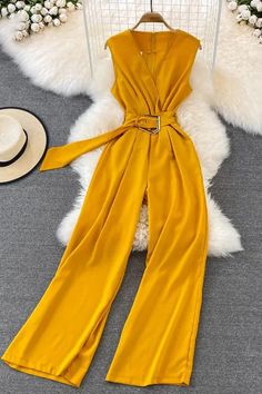 Sleeveless Belted Jumpsuit For Party, Elegant Yellow Jumpsuits And Rompers For Work, Elegant Yellow Jumpsuits For Workwear, Yellow V-neck Jumpsuits And Rompers For Work, Sleeveless Yellow Jumpsuits And Rompers For Spring, Yellow Sleeveless Jumpsuits For Spring, Yellow Sleeveless Jumpsuits And Rompers For Work, Sleeveless Belted Jumpsuits And Rompers, Sleeveless Fitted Jumpsuits And Rompers For Work