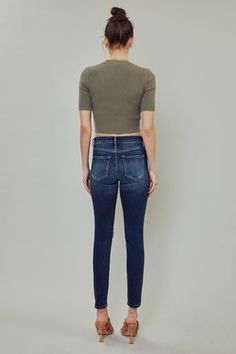 Faded light, medium, and dark-washed denim with distress, whiskering, and knee-destruction for a lived-in look. Our Serena High Rise Jeans sit above the natural waistline as they taper down the leg for a fitted, ankle-skinny silhouette. Made with stretch denim that holds its shape but stretches enough to hold and hug y